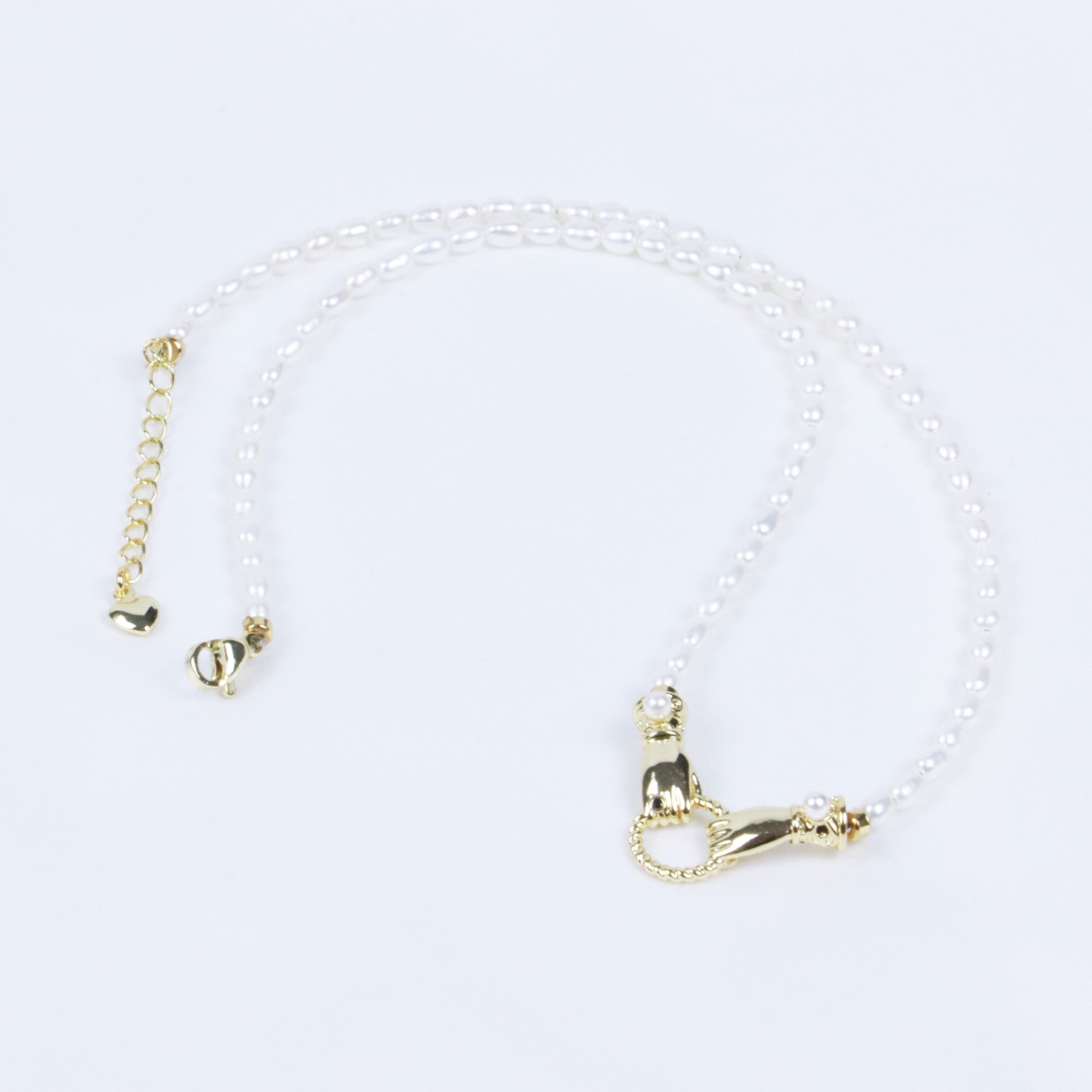 Rice Shape Pearl Strand with Alloy Gold Design