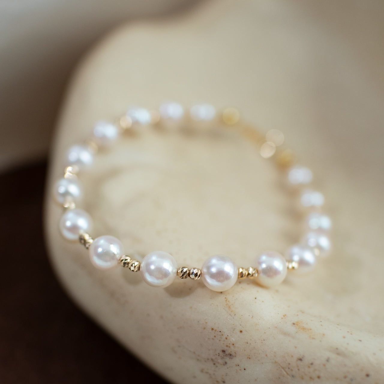 6-7mm Freshwater Pearl Bracelet with 18k Gold Laser Beads