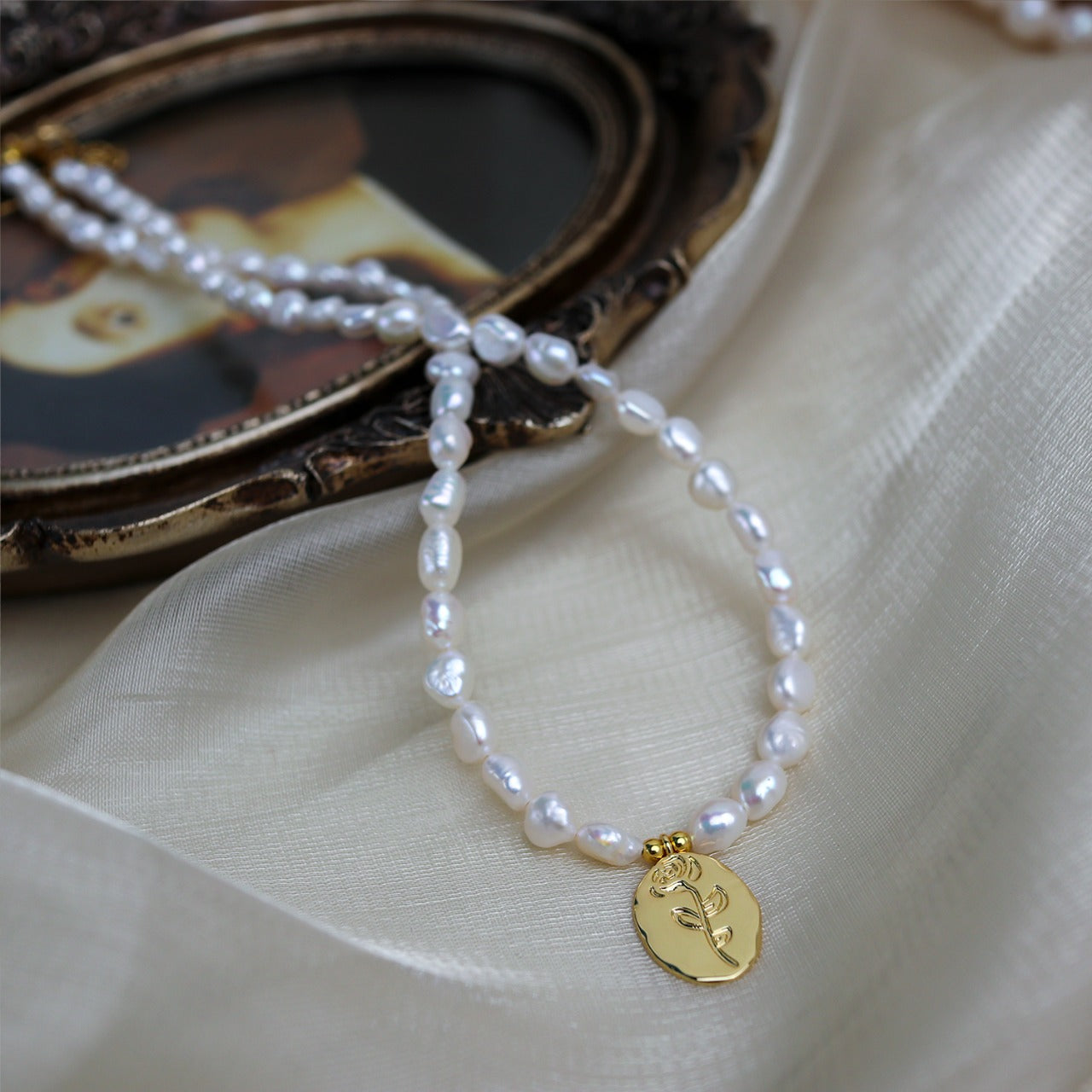 Baroque Pearl Necklace with Gold Medallion