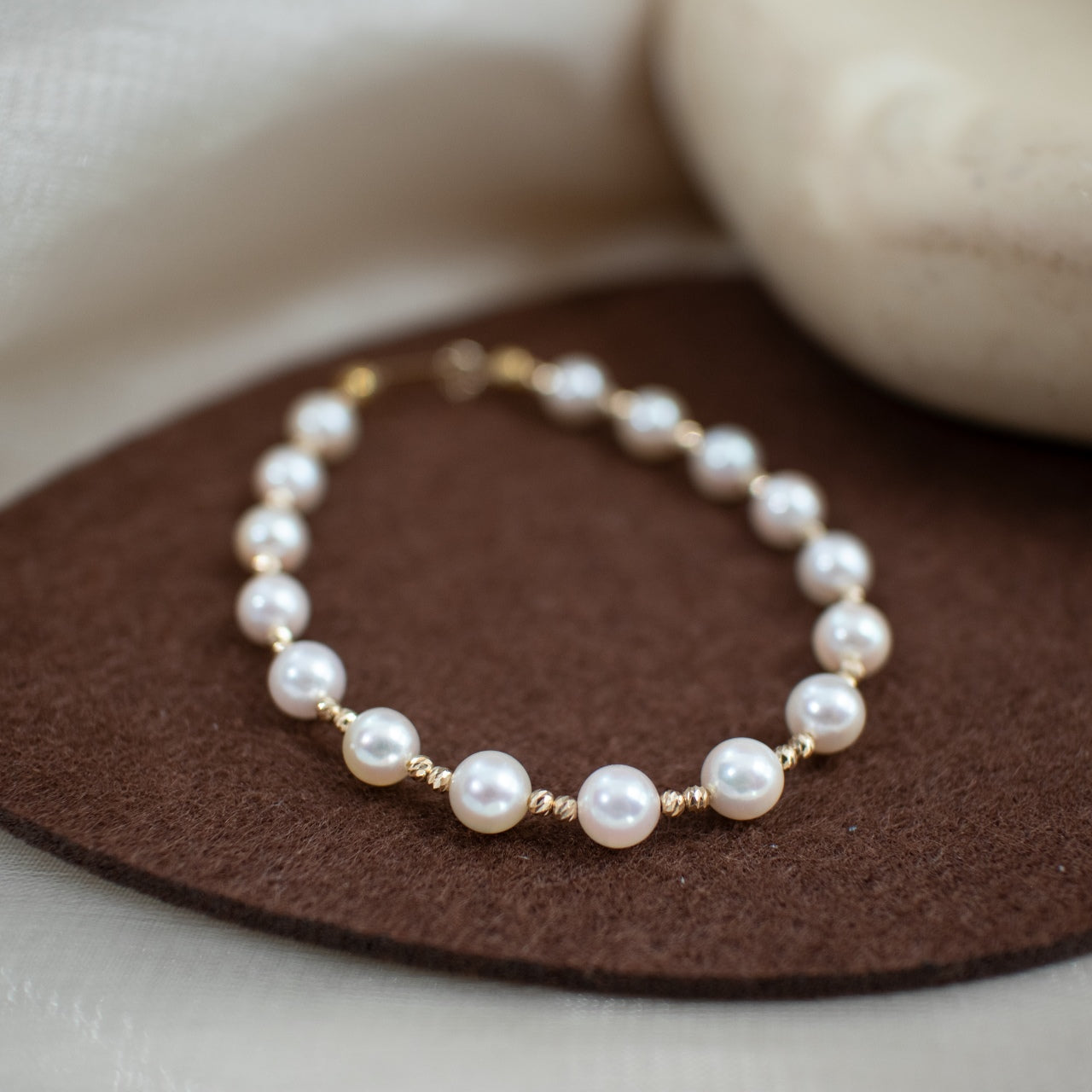 6-7mm Freshwater Pearl Bracelet with 18k Gold Laser Beads