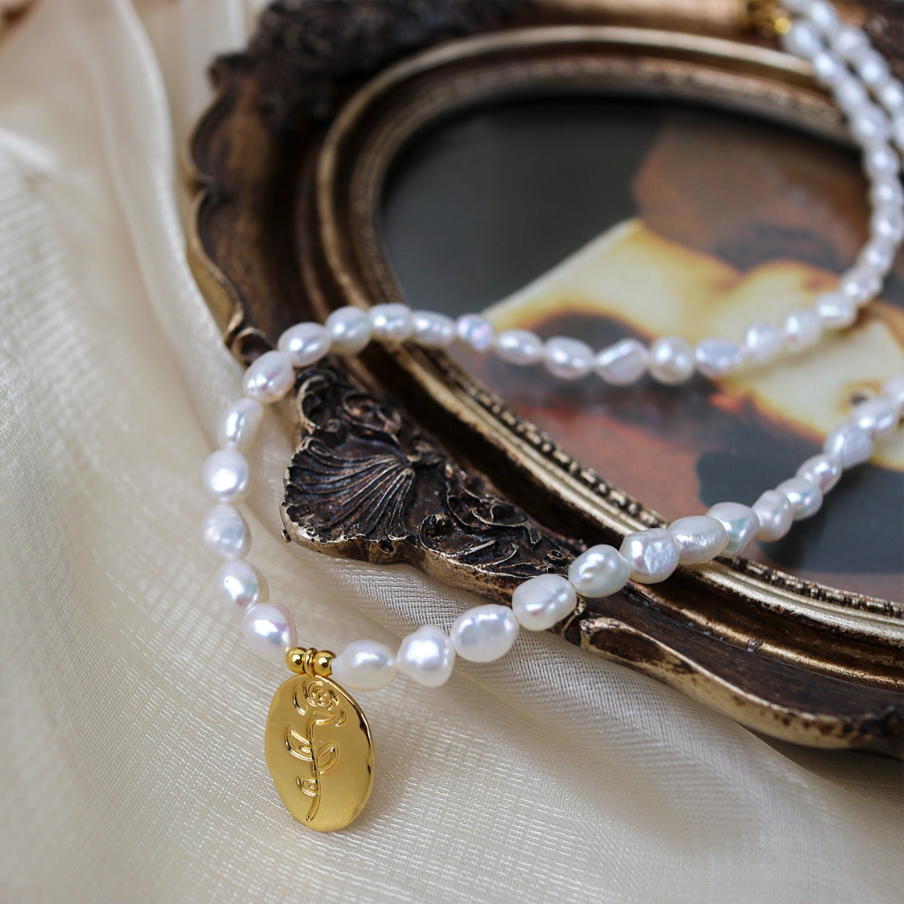Baroque Pearl Necklace with Gold Medallion