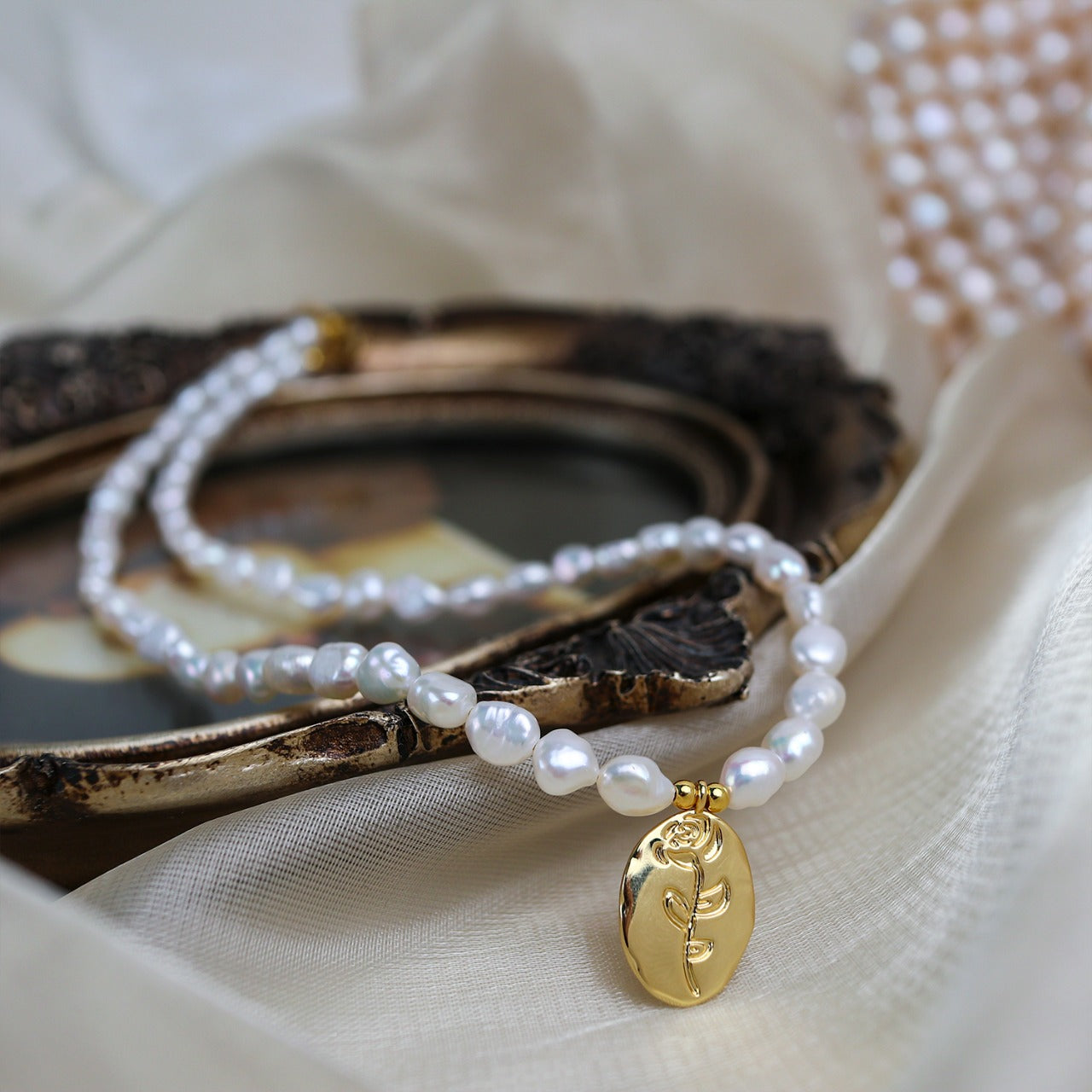 Baroque Pearl Necklace with Gold Medallion