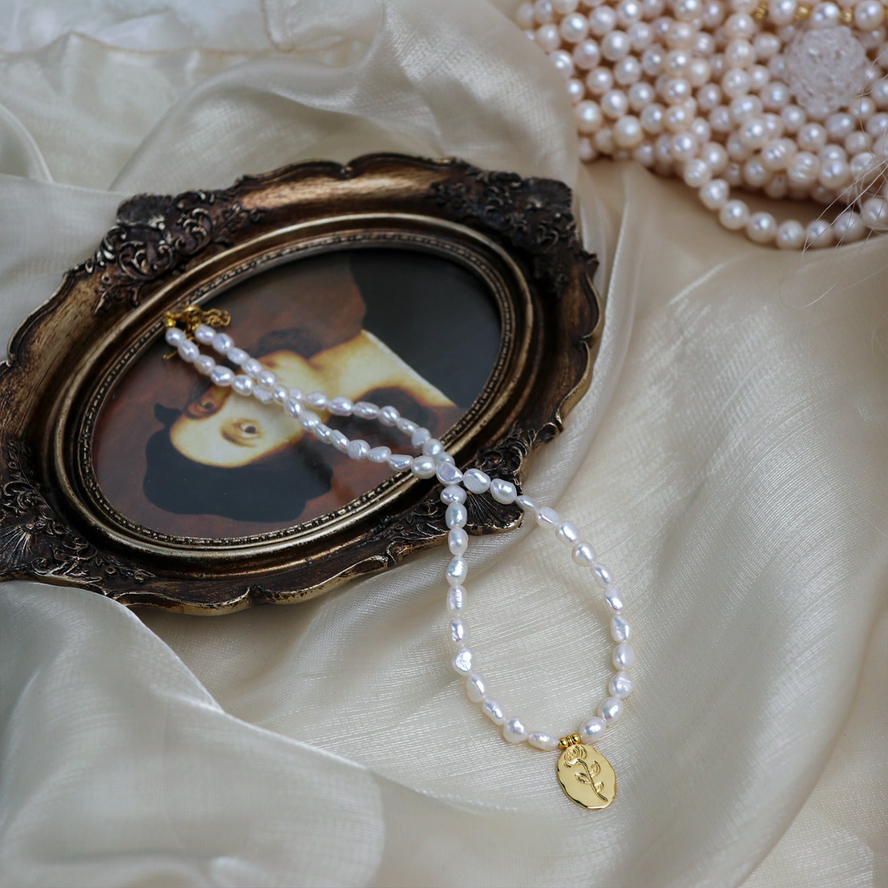 Baroque Pearl Necklace with Gold Medallion