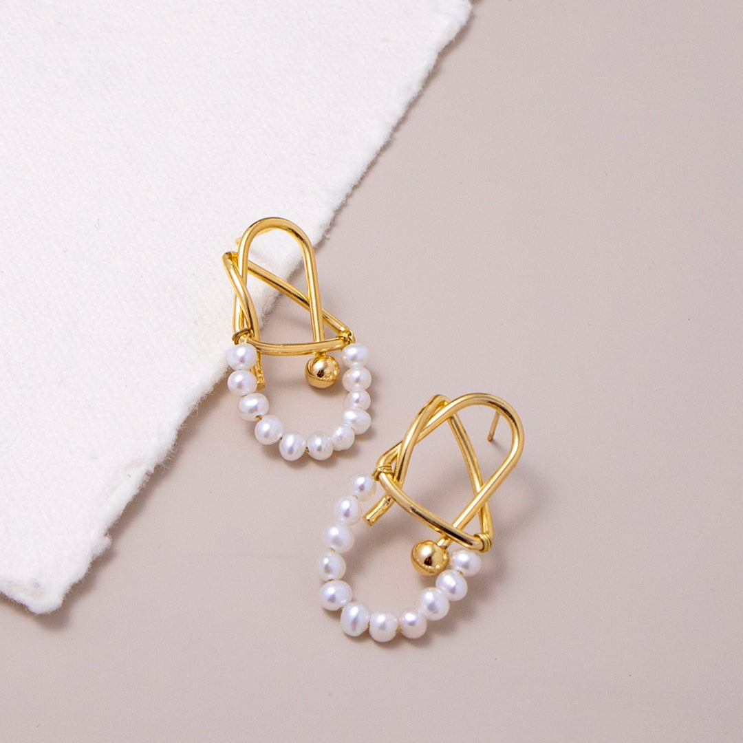 Modern Arc Baby Pearl Earrings